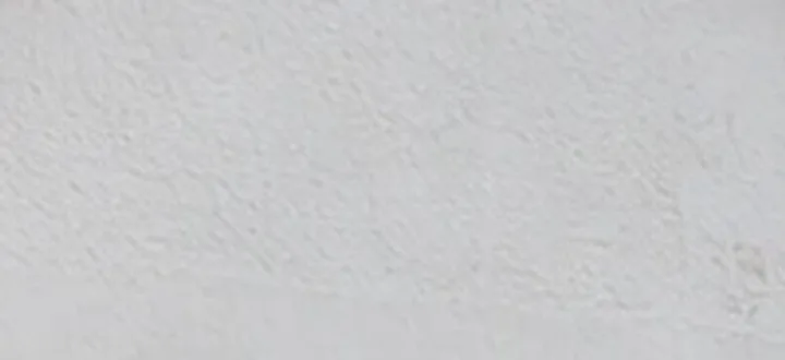Close-up of a smooth silicone render finish